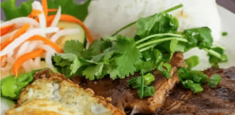 Grilled Pork chop and fried egg /com suan trung